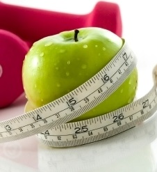 重量苹果和胶带测量